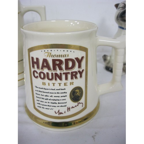 131 - An Eldridge Pope ceramic beer pump clip, various ceramic tankards including Thomas Hardy Country, Gu... 