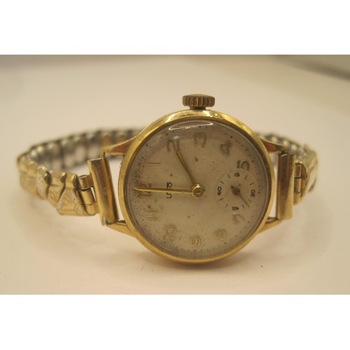 133 - Two ladies wristwatches each with 9 carat gold cases and gold-plated expandable bracelets. (1) An Av... 