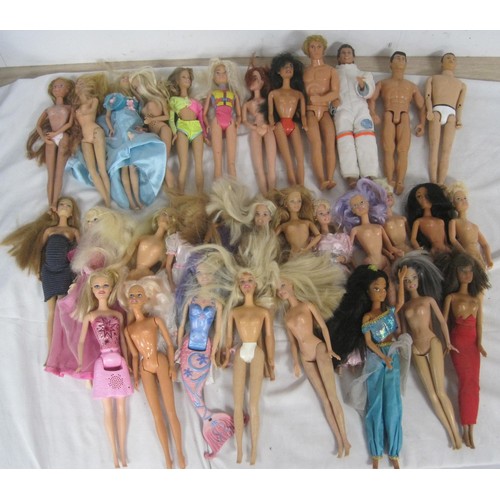 3 - A box of assorted Barbie and Ken dolls