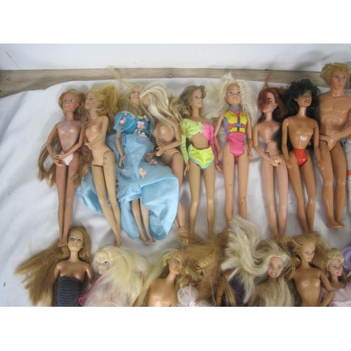 3 - A box of assorted Barbie and Ken dolls