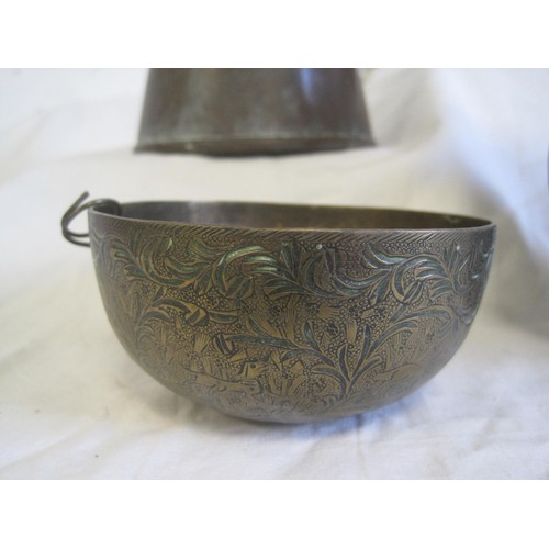 26 - A far eastern brass bowl with foliate engraving (diameter 10.2cm), a far eastern brass vessel with h... 