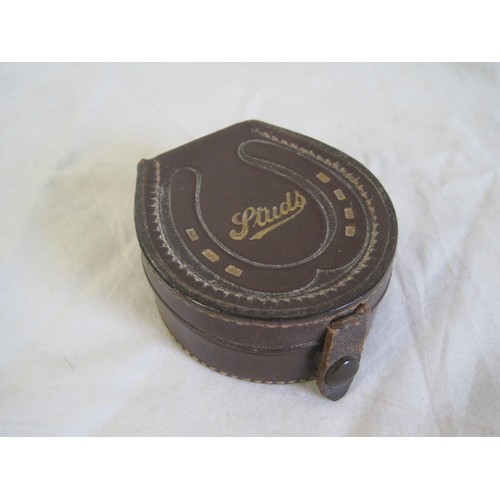 25 - A vintage His Master's Voice plaque (about 68mm x 76mm), a leather stud box with assorted studs and ... 