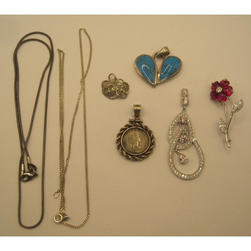 28 - A small quantity of white metal jewellery stamped 925 and silver - a flower brooch, a dramatic mask ... 