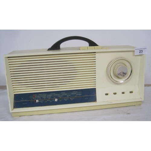 23 - Four vintage radios. (1) Bush receiver type TR 91.  (2) Philco Ford solid state. (3) Wien two band p... 