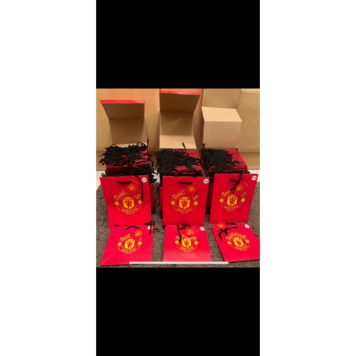 209 - 3 boxes containing a gross (144) of official Manchester United gift bags, all new and unused