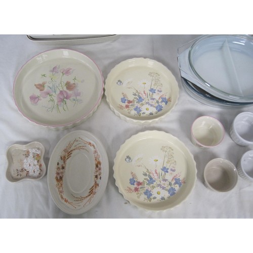 40 - A large quantity of Glass and pottery items to include Poole pottery flan dishes, Summer glory Gravy... 