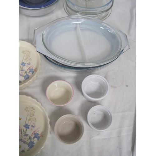 40 - A large quantity of Glass and pottery items to include Poole pottery flan dishes, Summer glory Gravy... 