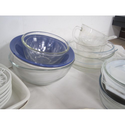 40 - A large quantity of Glass and pottery items to include Poole pottery flan dishes, Summer glory Gravy... 