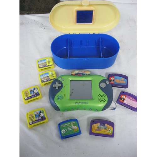 31 - Leapfrog Leapster 2 with games. A/f grubby and worn