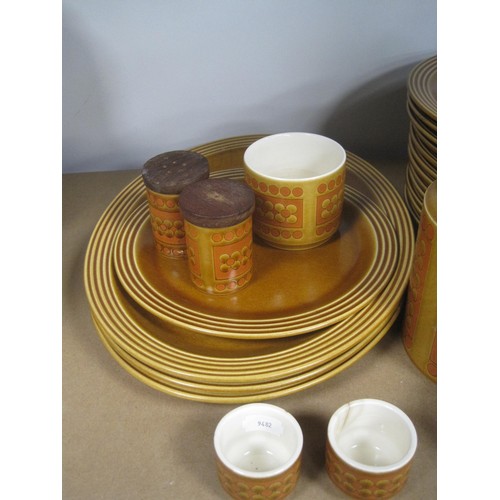 33 - Collection of Hornsea Saffron, platters, dinner plates, eggcups, storage jar, salt and pepper etc. (... 