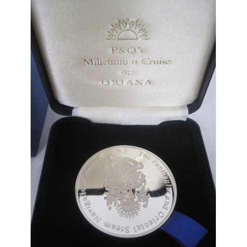 2 - A sterling Silver medallion in presentation case produced to commemorate the Millennium Cruise on th... 