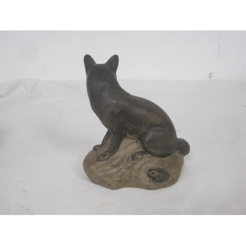 110 - Two Poole Pottery stoneware animal figures - a polychrome otter modelled with fish, and a fox with r... 