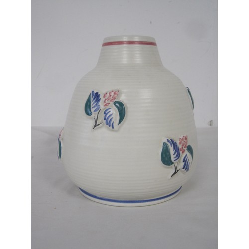 112 - Poole Pottery vase with flowers moulded in relief, shape 677, height 18cm