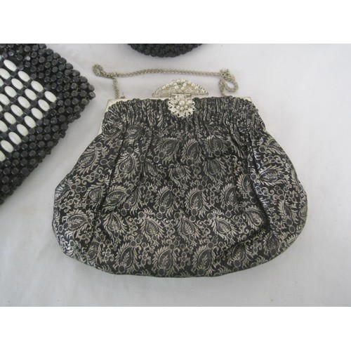 131 - Four ladies evening bags, beaded and sequinned etc,  the circular bag with a matching purse