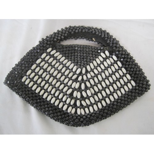 131 - Four ladies evening bags, beaded and sequinned etc,  the circular bag with a matching purse