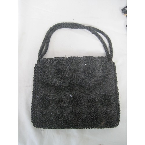 131 - Four ladies evening bags, beaded and sequinned etc,  the circular bag with a matching purse