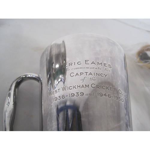 132 - A silver-plated tankard and a baluster tankard, both with engraving relating to West Wickham Cricket... 