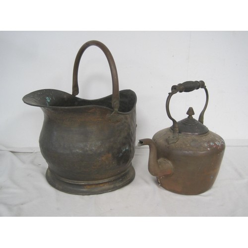 119 - An antique brass copper kettle, and a copper coal bucket.  Both generally sound but with a/f signs o... 