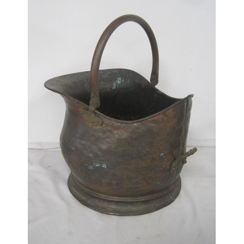 119 - An antique brass copper kettle, and a copper coal bucket.  Both generally sound but with a/f signs o... 