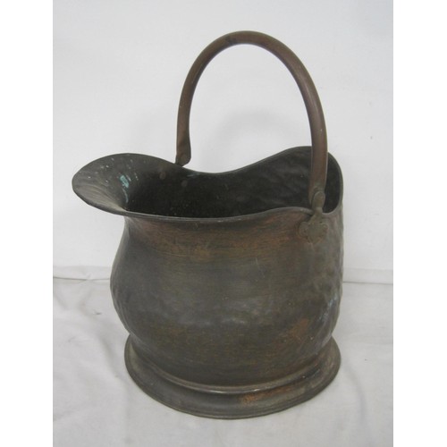 119 - An antique brass copper kettle, and a copper coal bucket.  Both generally sound but with a/f signs o... 