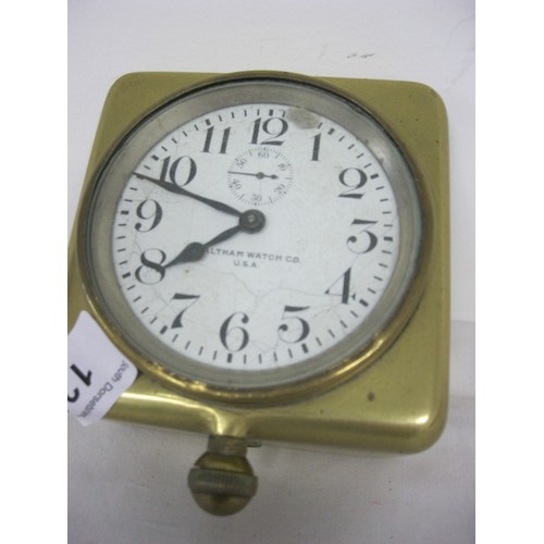 124 - A WW1 brass cased Waltham ship's bridge clock, in locking brass case, 7 jewel, 8 day mechanism, enam... 