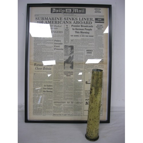 127 - A 40mm brass shell case and a framed & glazed copy of the Daily Mail from 4th September 1939