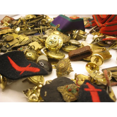 92 - A large quantity of military buttons, badges etc