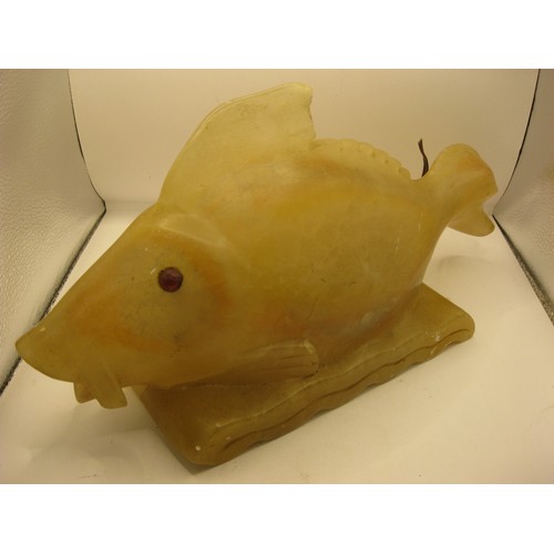 96 - A novelty lamp in the form of a fish carved in alabaster