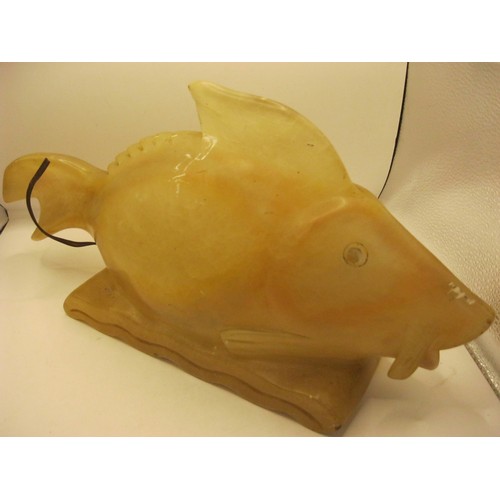 96 - A novelty lamp in the form of a fish carved in alabaster