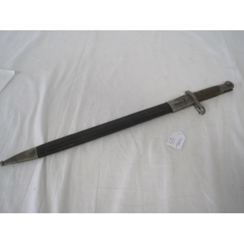 161 - A Spanish M1913 Mauser bayonet in scabbard, marked for Artilleria Fábrica Nacional of Toledo, in ver... 