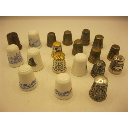 99 - A collection of thimbles to include 5 Poole Pottery examples