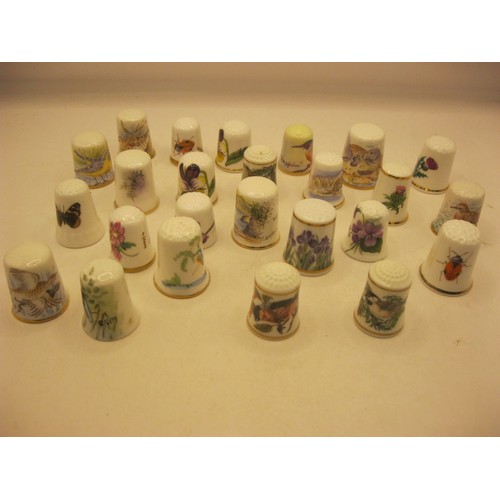 100 - 25 hand decorated porcelain thimbles to include birds/flowers etc, some signed