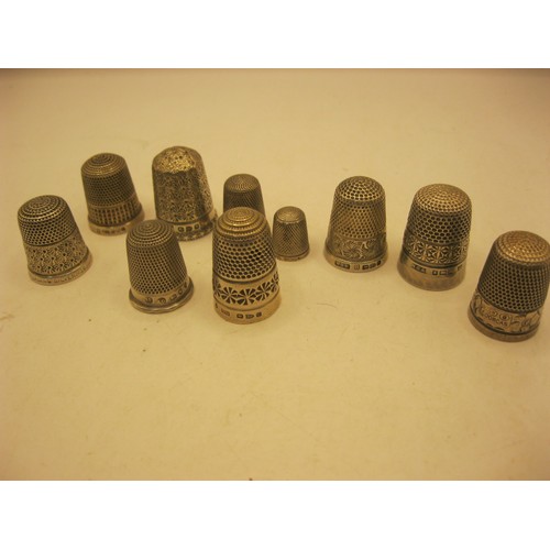 101 - 10 hallmarked silver thimbles of varying sizes