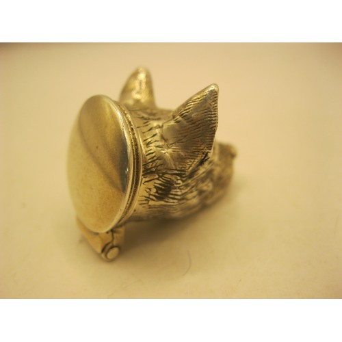 103 - A .925 marked silver pill box in the form of a wolf's head, approx weight 37g