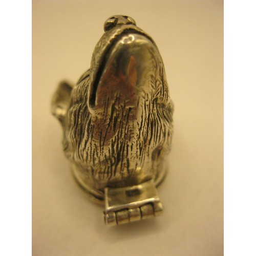 103 - A .925 marked silver pill box in the form of a wolf's head, approx weight 37g