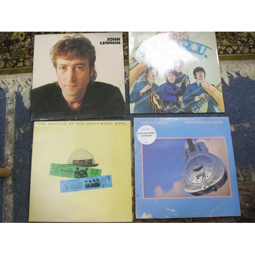 148 - Four LP's including Dire Straits and The Beatles