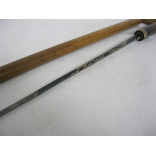 35 - 490 A malacca cane shafted sword stick with a fine 35.5cms diamond section blue decorated blade and ... 