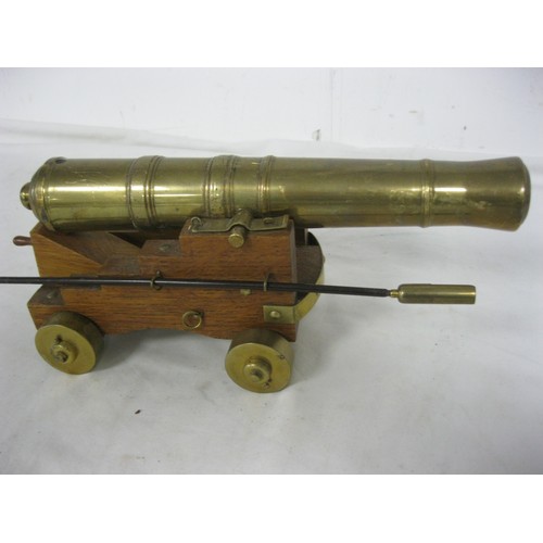 39 - 494 An impressive brass or bronze desk top Signal Cannon. The barrel being 31cms long, with an appro... 