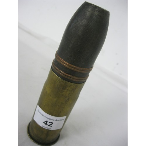 42 - 497 A complete inert WW1 artillery shell and brass casing. Date stamped 9.17 (for September 1917). O... 