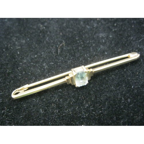 60 - A 9 carat gold art deco style bar brooch set with a clear stone, approx weight 2.28g