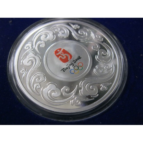 24 - A Beijing 2008 .999 silver proof set of 6 coins, in presentation case, case slight a/f, approx silve... 