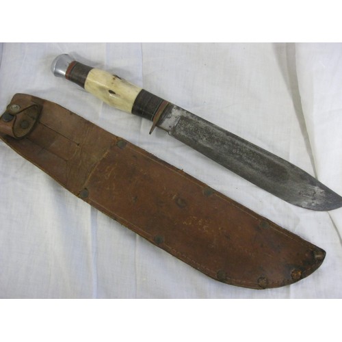 79 - A vintage sheath knife with bone handle, 8