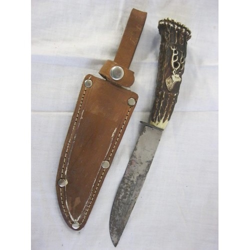 81 - A sheath knife with stag design handle, 3