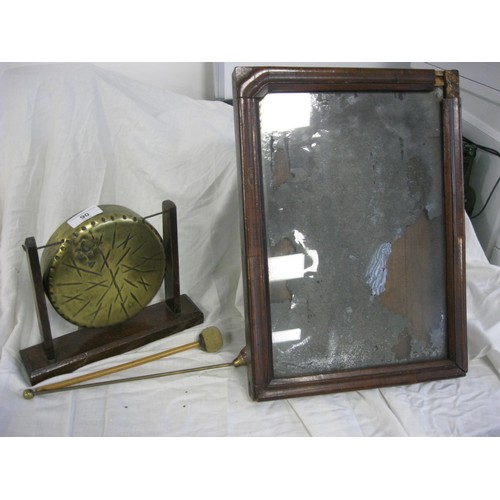 90 - A brass tabletop gong with mallet striker, a brass candle snuffer and an antique wooden frame, a/f