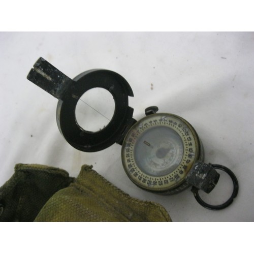 18 - A 1944 dated TG & Co WW2 Mark III compass in webbing pouch