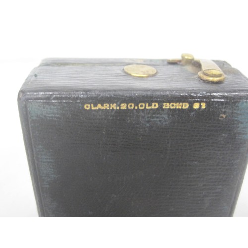 97 - An antique travel inkwell with bottle, marked Clark 20 Old Bond Street, a gold-plated propelling fob... 