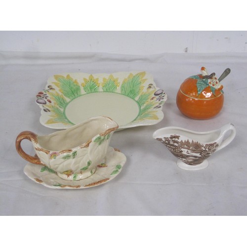 100 - A Clarice cliff Jam pot (a/f) in the Orange pattern, Clarice cliff Sauce boat for Royal Staffordshir... 