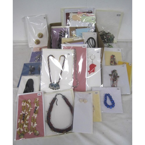 104 - A box of about thirty-eight items of costume jewellery - necklaces, keyrings, earrings, etc. Each it... 