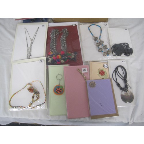 104 - A box of about thirty-eight items of costume jewellery - necklaces, keyrings, earrings, etc. Each it... 