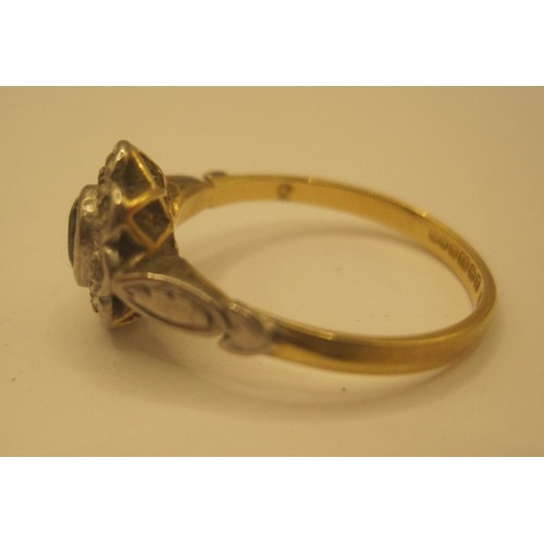 115 - 18ct gold ring with a possible central sapphire size l Total weight 2.5 grams